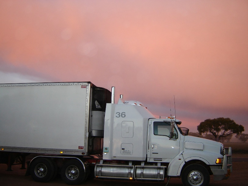  A truck parked on the side of a road